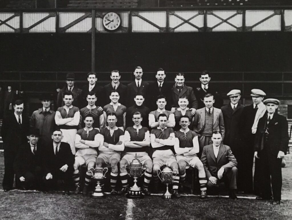 Ferryhill Athletic team photo in front of the Clock Stand Roker Park circa 1937. By kind permission of Geoff Wall